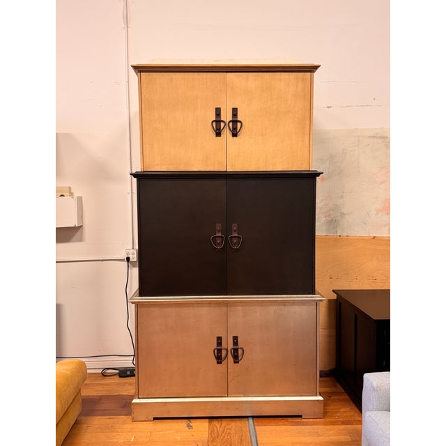 Design Plus Gallery presents the Menage W624 Three-Piece Valise Armoire from Dunkirk & Associates. This commanding three-...