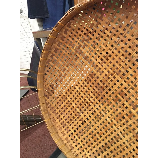 This large round wicker accent element is perfect for a wall hanging or use underneath a stylish coffee table to toss...