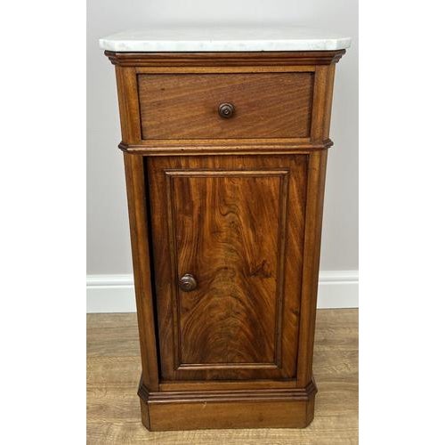 A beautiful Antique French bedside table featuring an elegant burr marble top and classic proportions, perfect for adding...