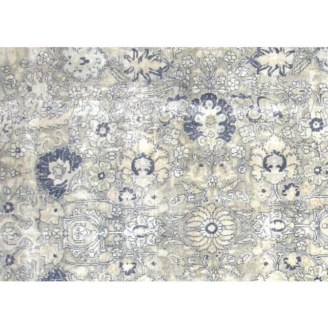 1940s Persian Tabriz Rug. Hand woven in the Tabriz region of Northern Iran. Distressed and refinished in the U.S. The...