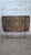 Folding garden table in a bistro/guinguette style, likely dating from the 1900s-1930s. The rectangular metal tabletop has...