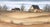 Farm landscape by Dessie Wilcox (American, b. 1948). Signed with date and location in the lower left corner ("Dessie...