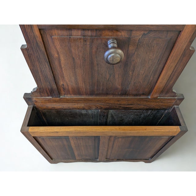 Add timeless charm and practical function to your entryway or mudroom with this beautiful antique wooden hall tree....