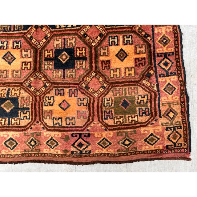 A rare antique Ersari Turkmen tribal rug showcasing the prized "Tauk Nuska" (Chicken Foot) gul — an all-over interlocking...