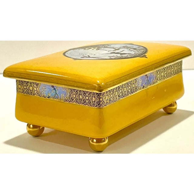 Art Deco carltonware luster moonlight frolicking pixie table box, for Dunhill. England, circa 1930s. An extraordinary...