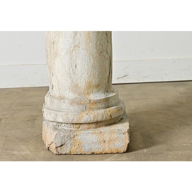 A fabulous 18th century carved stone column from Portugal, best described as Gothic or Romanesque in style, using the...