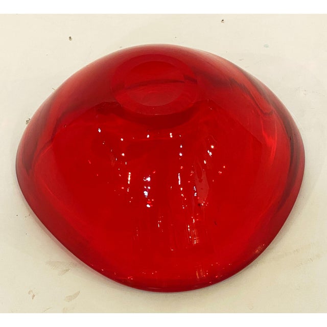 A fine Mid-Century Murano art glass bowl from Italy, handcrafted by artists using traditional glassblowing techniques....