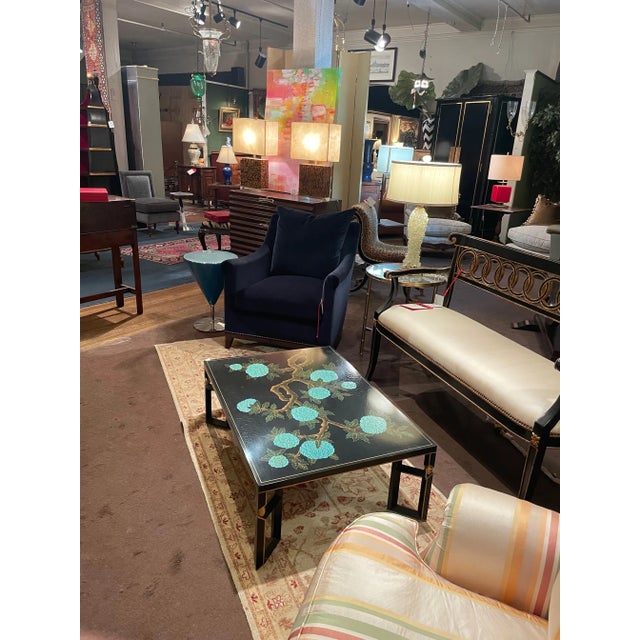 This low (just 14 inches high), sleek coffee table was made by Baker Furniture Company, circa 1976. Stunning black lacquer...