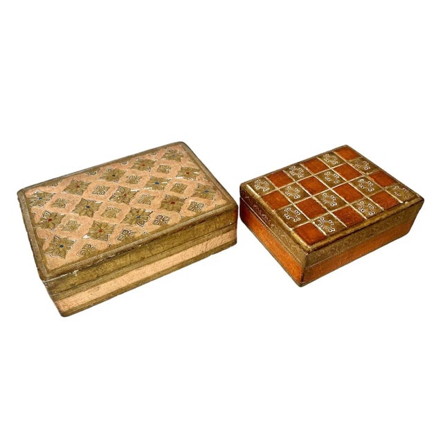 A delightful duo of paint-decorated Florentine boxes accented in gilt. Perfect to add a little depth to your table top or...