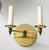 Bespoke two-arm brass sconces in the midcentury manner - a Pair or Set of 2. Measures: W 7.5" x D 6" x H 7.5" Back plate:...