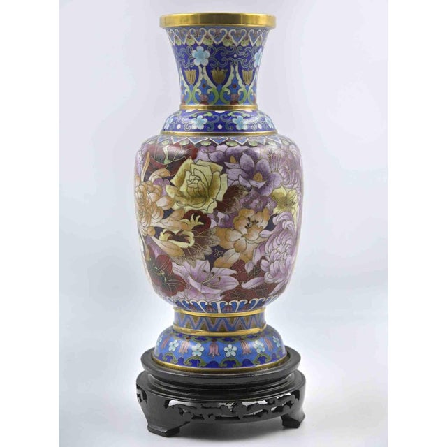 Vintage Chinese vase early 20th century Ceramic and metal on a wooden base. Measures: 31x13 cm.