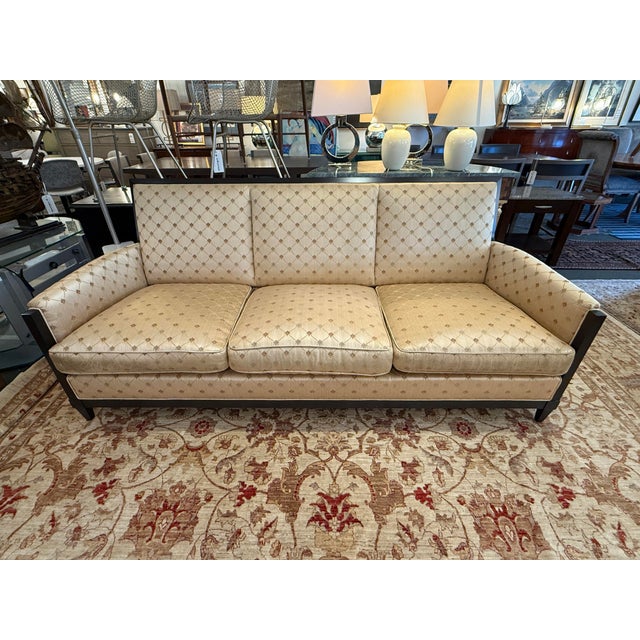 Design Plus Gallery presents a Sofa from Donghia. Upholstered in a champagne satin with a lattice of stylized floral...