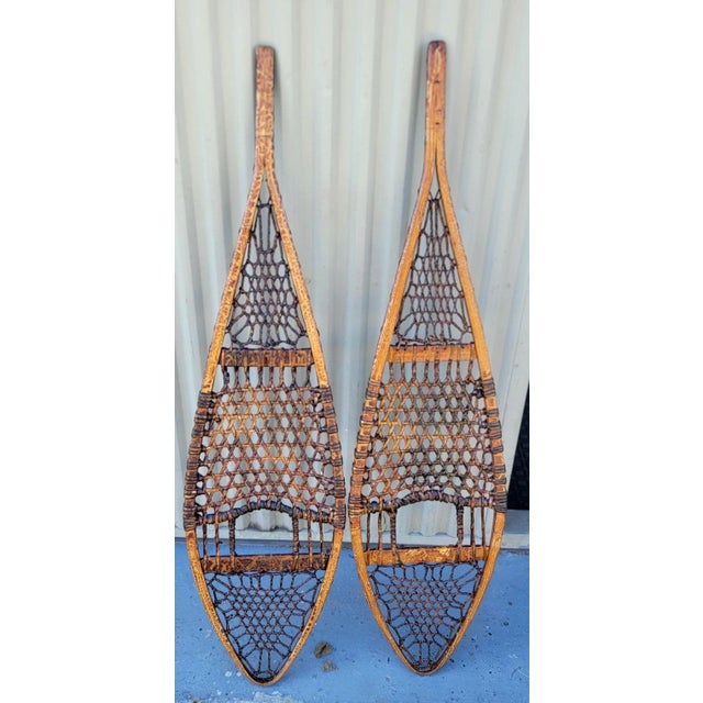 Amazing Leather & wood snow shoes from the North East.The condition is very good and have a amazing crackle varnished...