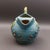 Roseville USA Vintage #1325 Bushberry Blue Art Pottery Ice Lip Pitcher. Measures approximately 9" long, 7" wide, 9" high.