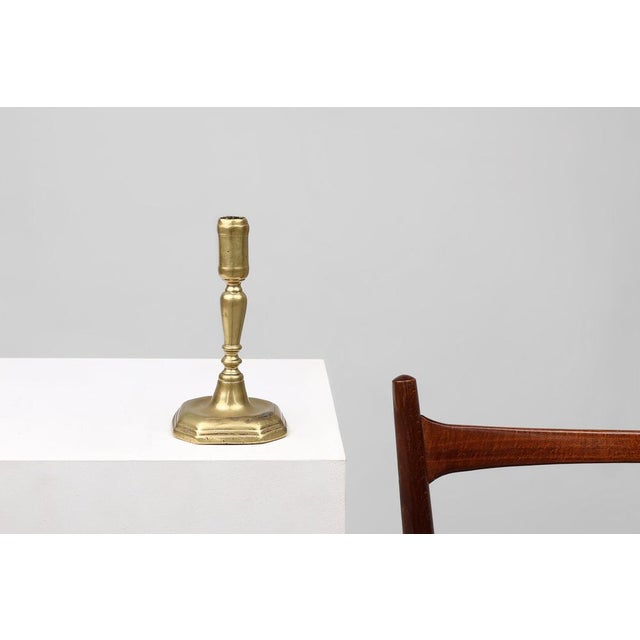 This rare candlestick, crafted in France during the 16th century, exemplifies early French bronze craftsmanship. Its...