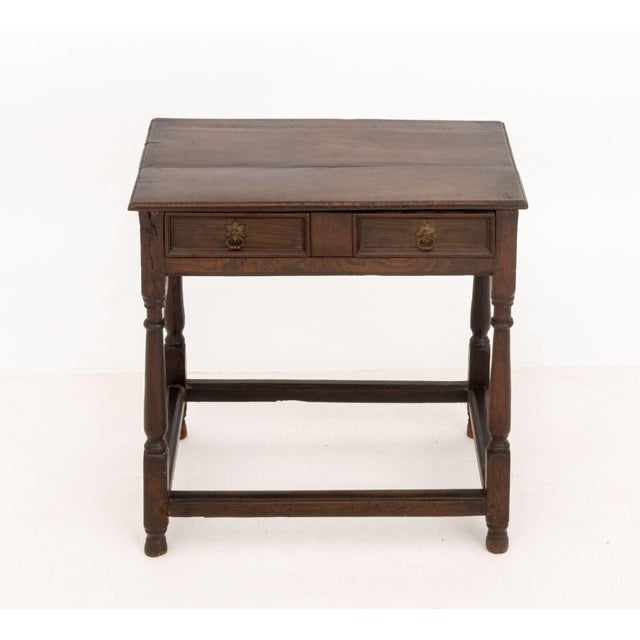 Baroque Style Oak Work Table, with single frieze drawer above turned wood legs conjoined by box stretcher. 27.25" H x 28"...