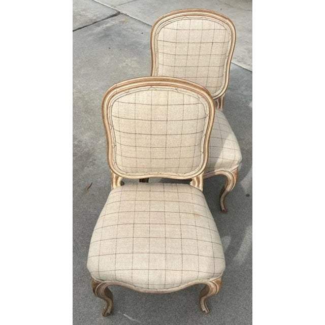 Early 20Thc French small chairs covered in fine plaid linen.The finish is original white washed painted surface.The chairs...