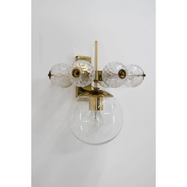 Designed by bejvl in the 1980s, this beautiful wall lamp was part of a large concept of luminaires using different sizes...