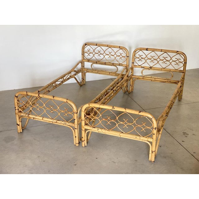 Pair of 70s bamboo beds, the internal measurements are 80x190cm, footboard height 61cm.