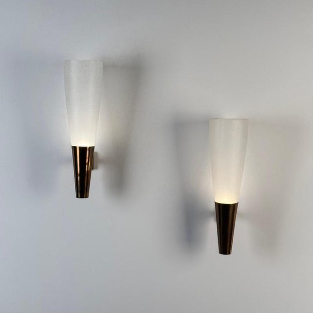 A rare and sculptural pair of large “Model 1537” wall lights designed by Pietro Chiesa for Fontana Arte in the 1940s — an...