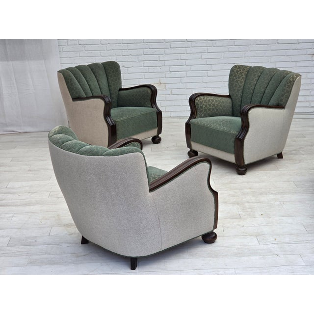 1960s, Danish relax chair. Original green and light grey furniture wool. Dark oak wood, brass springs in the seat....