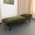 This is an early mid-century upholstered daybed chaise lounge, featuring a sleek, architectural silhouette reminiscent of...