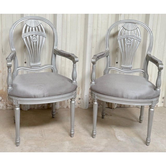 Pair of Maison Jansen Style Silver Leaf Montgolfier Armchairs, France A refined pair of Maison Jansen style silver-leaf...