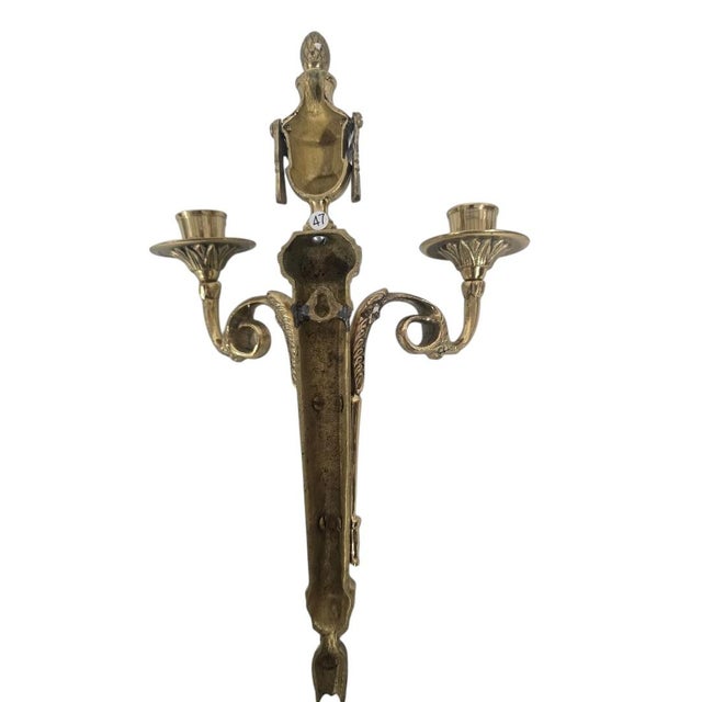 rnate matching pair of vintage cast-brass wall candle sconces in the French Louis XVI or Neoclassical style. Each sconce...