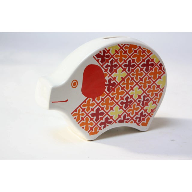Whimsical porcelain elephant piggy bank by Carlton Ware of England (circa 1969-early 1970s). Carlton Ware made a range of...