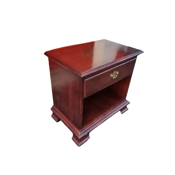 Solid Cherry side table or can be used as a nightstand beautiful craftsmanship with drop down brass handles. Good vintage...