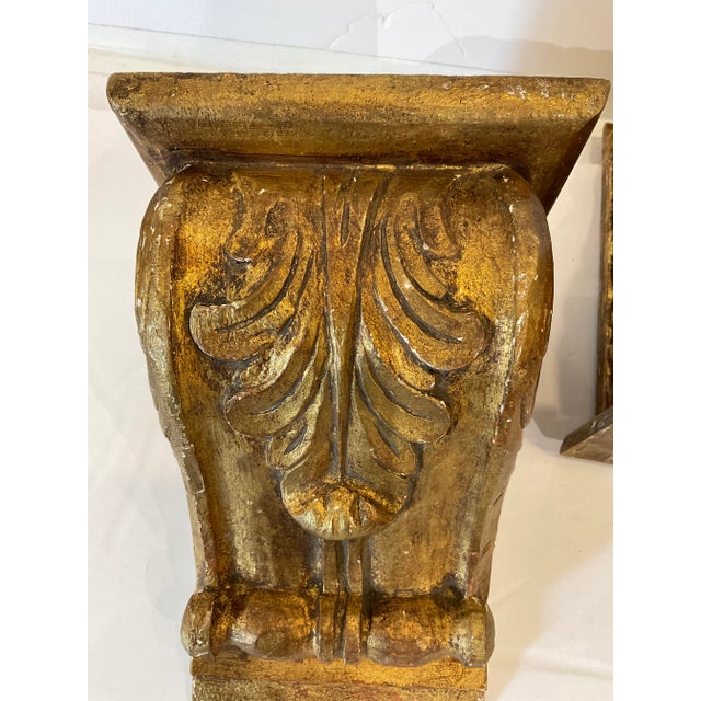 19th Century hand craved gold gilt wood wall sconce featuring an Italian floral motif. Showing a nice amount of age