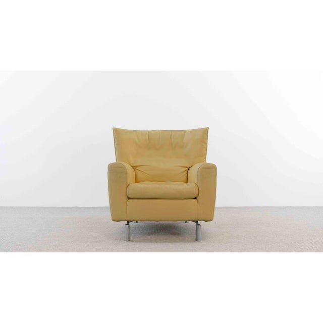Armchair, model "drop," designed by gerard van den berg for molteni & c. In the 1990s. Upholstered in original light...