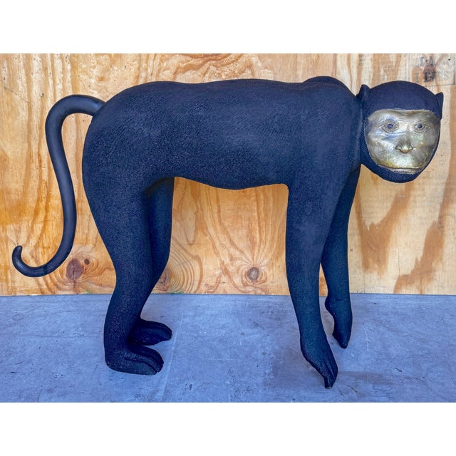 Large 1980s Crouching Monkey Sculpture in Black & Gold This large 1980s crouching monkey sculpture in black is a striking...