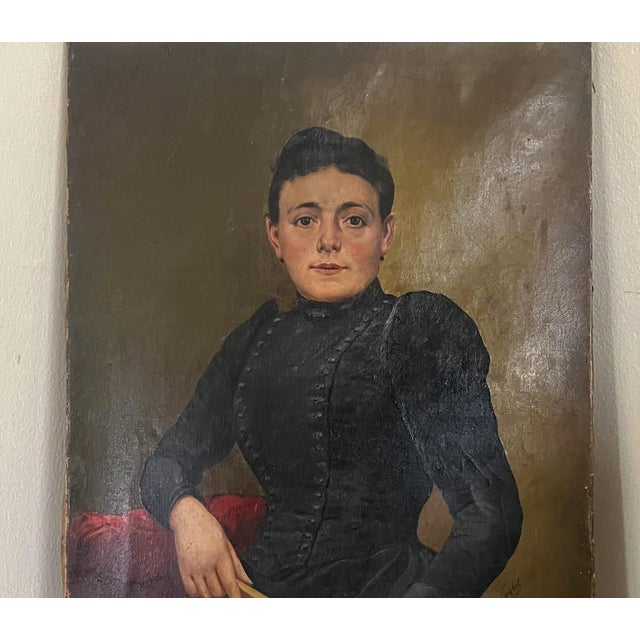 Acquired in France, a stunning 19th century woman portrait oil on canvas. The woman dressed in black has expressive...