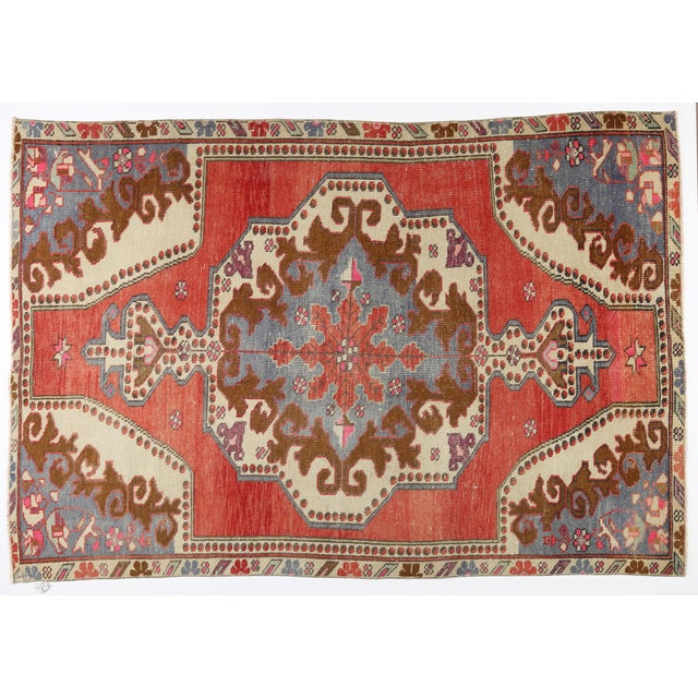 Vintage Tribal Konya Rug – Handwoven Anatolian Wool in Rich Red, Indigo, and Cream This striking vintage Konya rug...