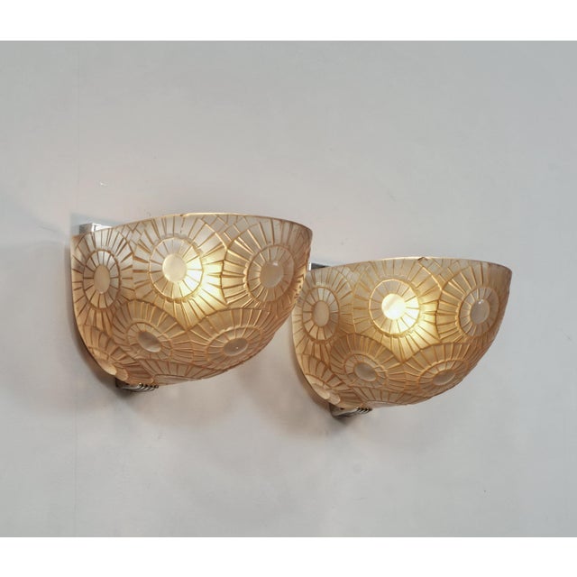 Simonet frères A very rare pair of 1925-1930 French art deco wall sconces. Nickel plated solid brass or bronze mounts hold...