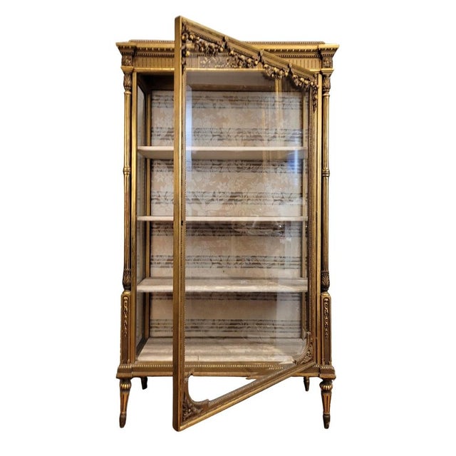 Napoleon iii display cabinet, carved and gilded wood, circa 1900 – france style: napoleon iii materials: wood and glass...