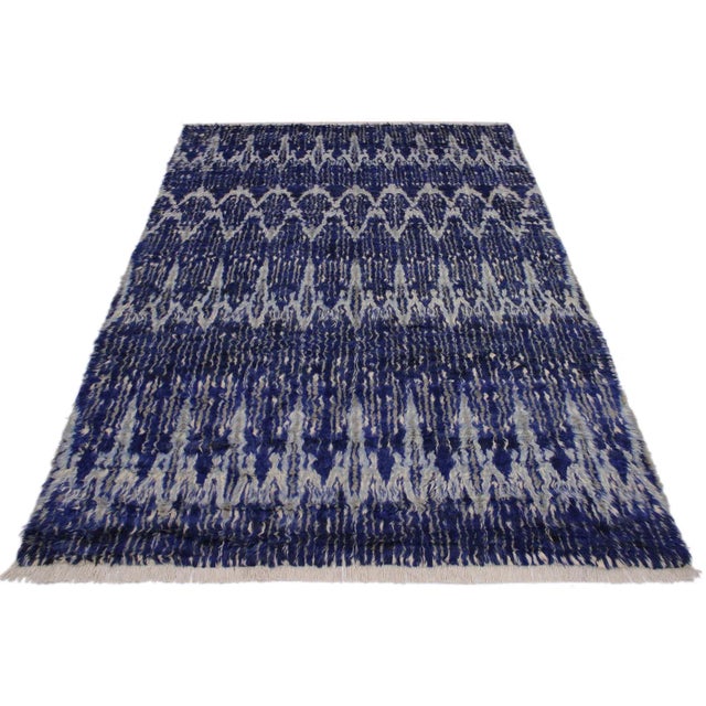 Hand knotted from finest quality wool, this one-of-a-kind fashionable handmade Moroccan rug crafted by skilled artisans...