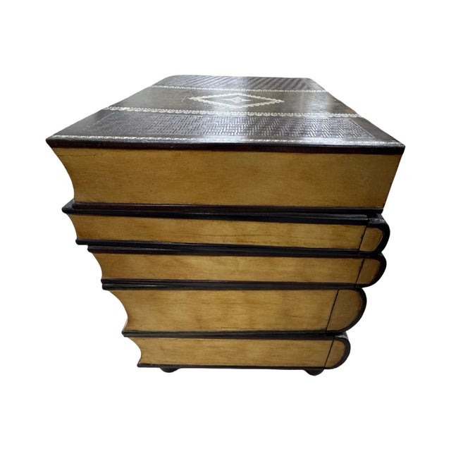 If you love books- you will Love this book table buy Maitland Smith. Each book is a drawer. Perfect as an end table with...
