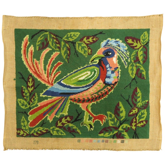 An interesting French needlepoint with a colorful pigeon from the middle of the 20th century. The bottom has an...
