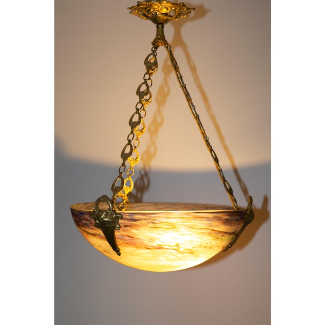 Ceiling lamp from france around 1930, signed muller freres luneville. The lamp is in very good condition, the bronze frame...