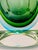 Vintage Italian art glass vase attributed to Murano, with a rounded faceted form and recessed central cavity. The hand-...