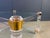 Vintage coffee table with an acrylic frame, brass corners and glass plates. Good condition. Very modern looking and...