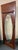 Design Plus Gallery presents an Ornately Carved Wood Door with Beveled Oval Glass. This distinctive architectural piece...