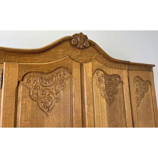 Vintage French Louis XVI Oak Four Door Carved Armoire For Sale - Image 4 of 12