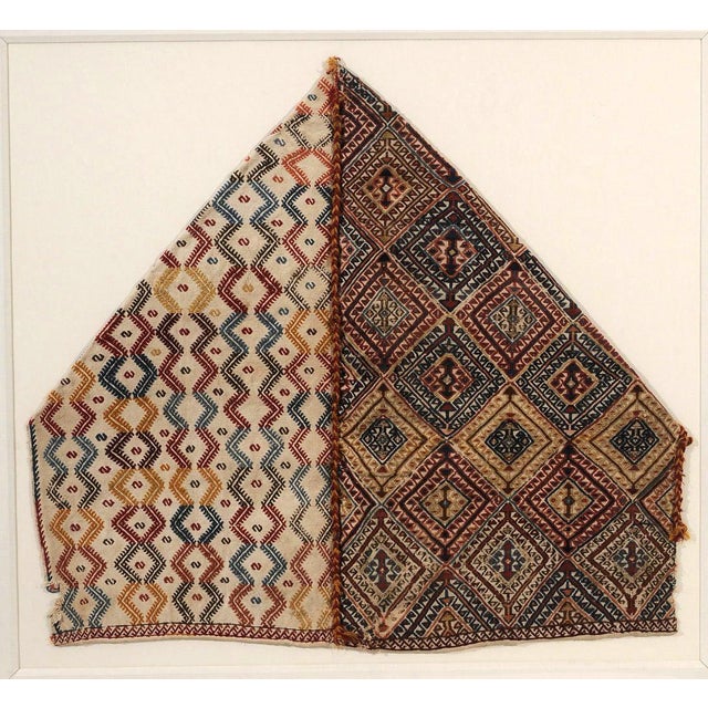 A professionally framed antique hand-woven Turkish textile from Anatolia circa late 19th century. The panel was likely a...