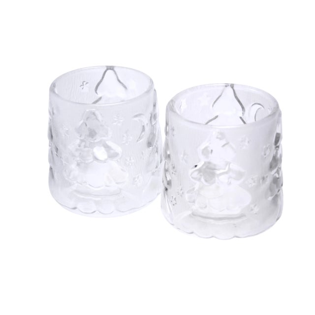 Pair of vintage frosted glass Christmas tree votive or tea light candle holders. Marked "Crystal Palace." Light wear.