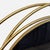 Crafted from iron, reflective glass, and MDF backing, this wall mirror has a polished gold metal finish. Brand: UMA...