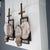 Pair of large geometric frame sconces with antique bronze finish and overlapping cut agate slabs. Sample rectangular...