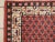Handmade vintage small rug from India in red colour. It is in original good condition from the end of 20th century....